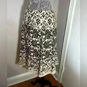 Caroll - French Linen A-line Skirt. Lined. Geometric Floral Pattern. Size: 38T.